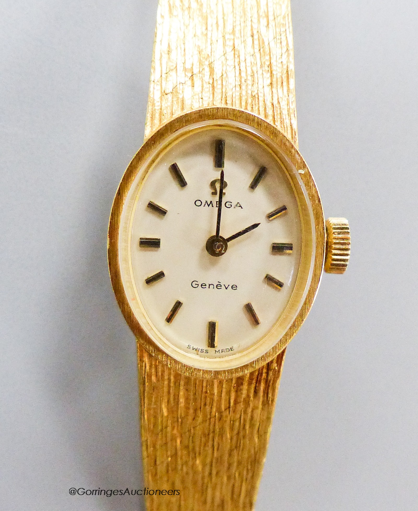 A ladys' 18ct gold Omega manual wind wristwatch